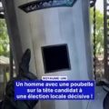 Un homme avec une poubelle sur la tête candidat à une élection décisive au Royaume-Uni
